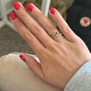 Adjustable ring with blue gems